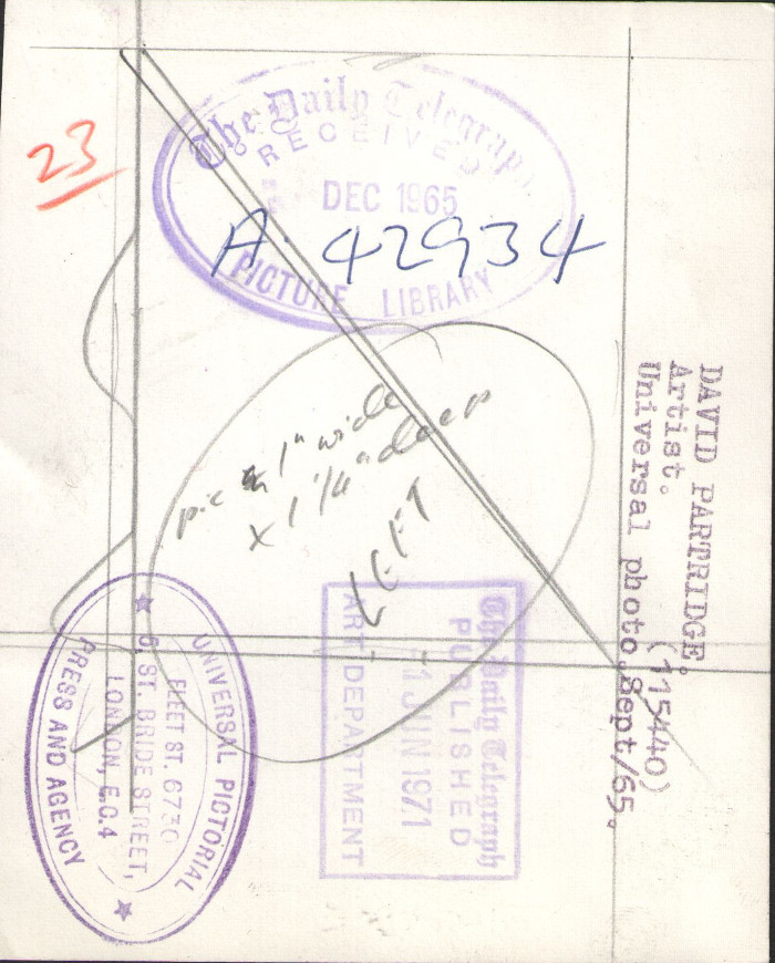 Reverse side, stamped by photo agency